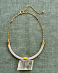 Luckie Squared Optical Calcite pendant on golden cord