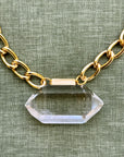 Image of Zoe necklace by Dorow Collection. Double terminated Clear Quartz pendant on golden link chain.