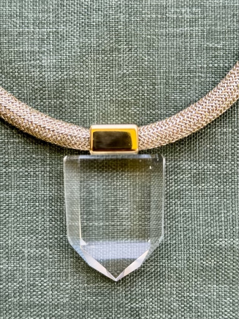 Close up view of clear quartz pendant from Dorow Collection